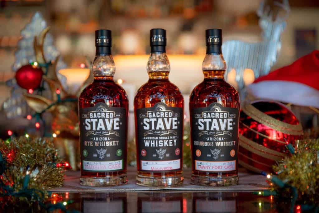 SanTan Spirits Sacred Stave American Single Malt Whiskey, Sacred Stave Arizona Bourbon, Sacred Stave Arizona Rye, shown in a holiday setting.
